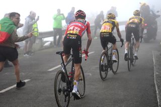 Sepp Kuss trails behind Jonas Vingegaard and Primoz Roglic on the Angliru at the Vuelta a España