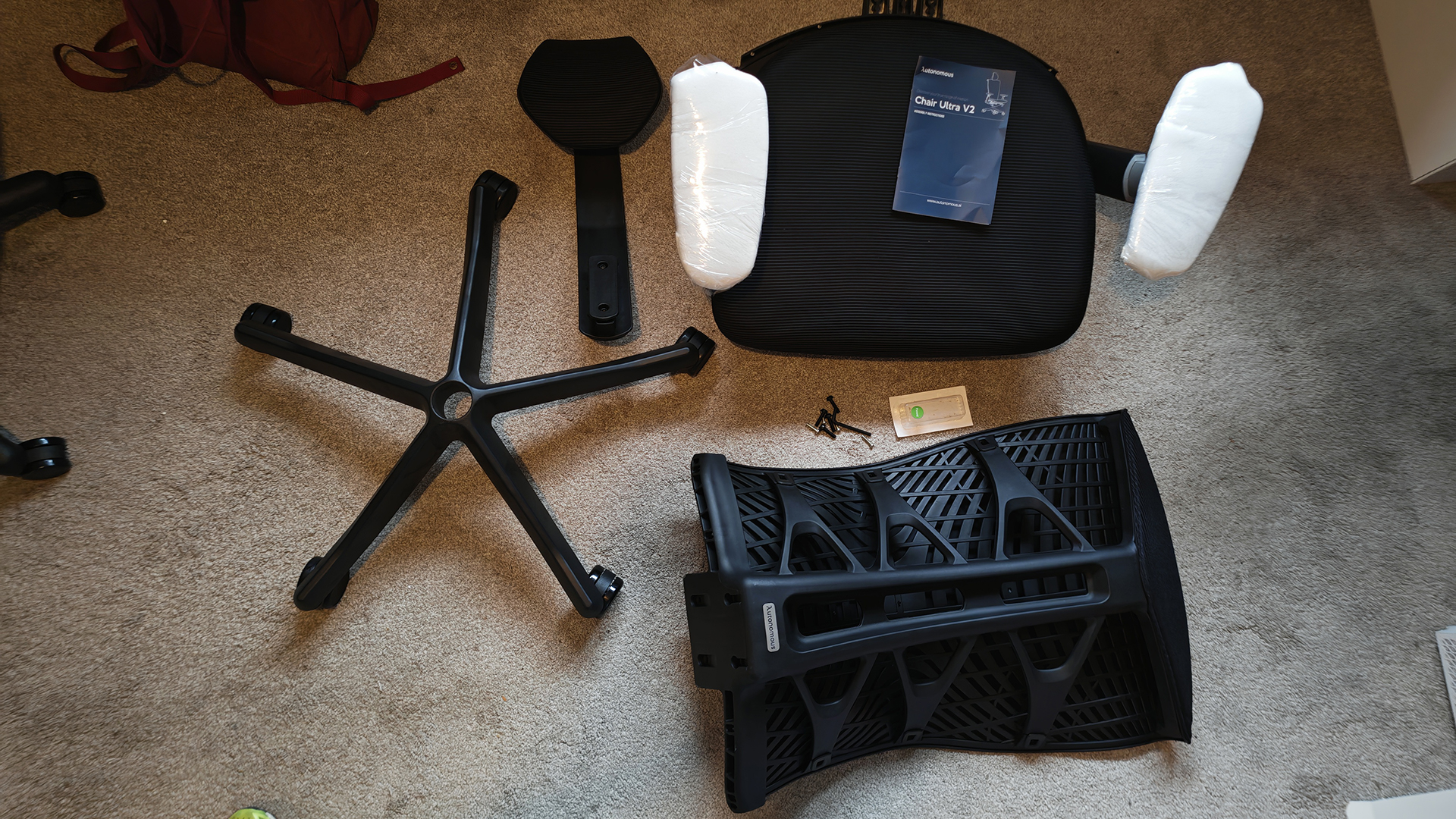 A selection of LiberNovo Omni office chairs in a home work place.