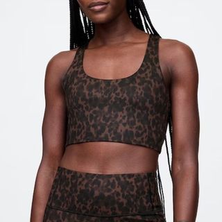 GAP leopard print medium support sports bra worn by model