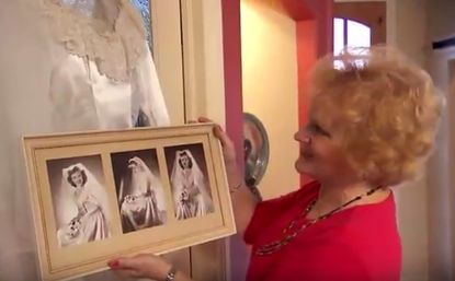Jane Foster with her mother's wedding photos.