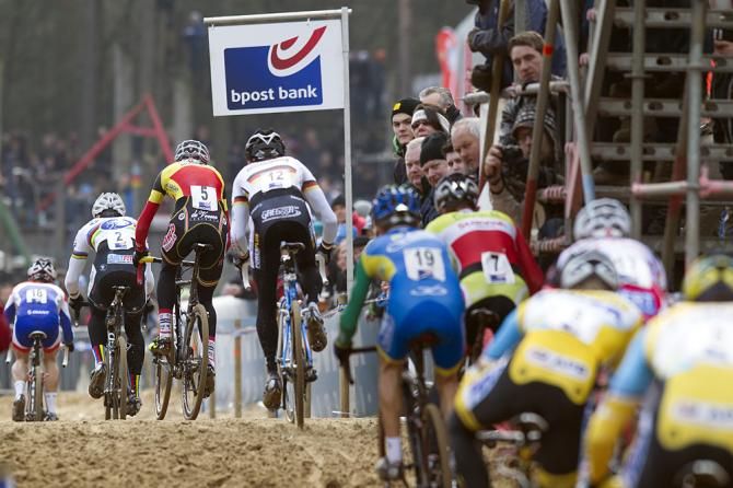 The riders queue up in the sand