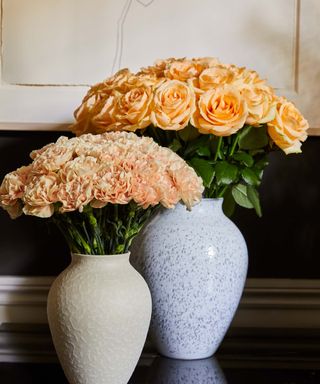 rich hued flowers for fall in white vases