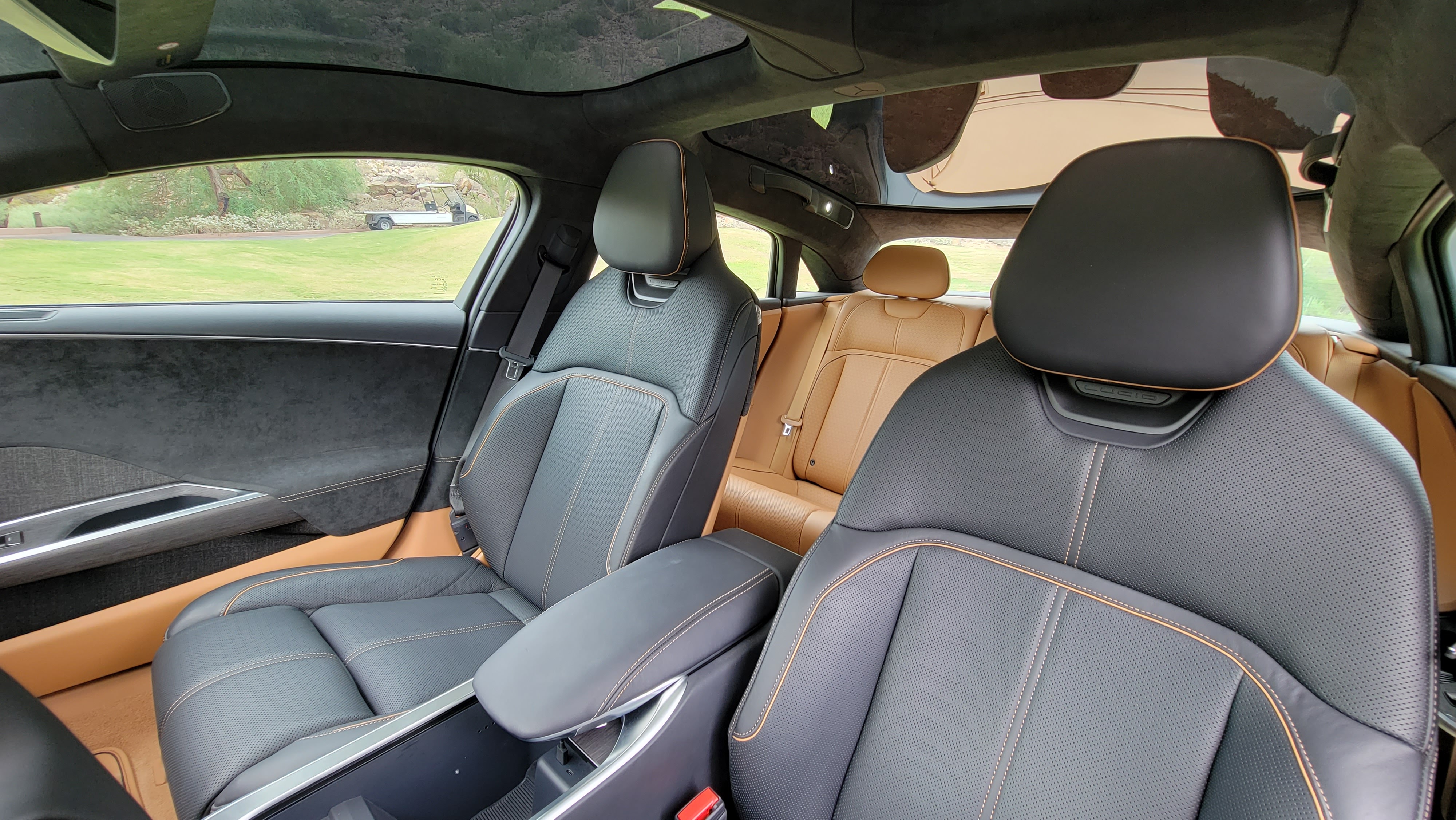 Inside the Lucid Air cabin showing front and rear seats