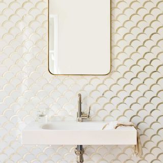 Bathroom tiles in a metallic, glossy finish