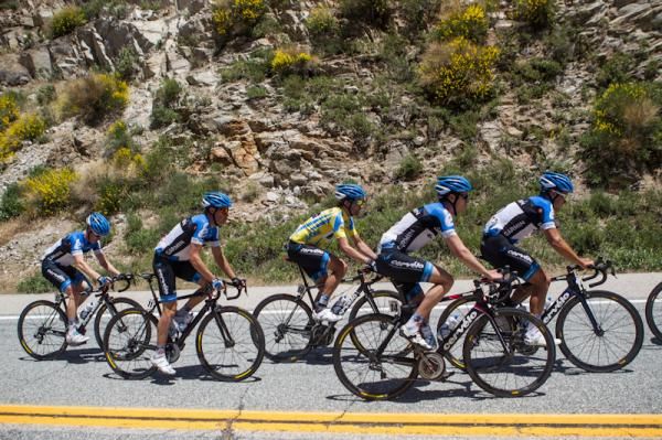 David Zabriskie riders in the safety of his team