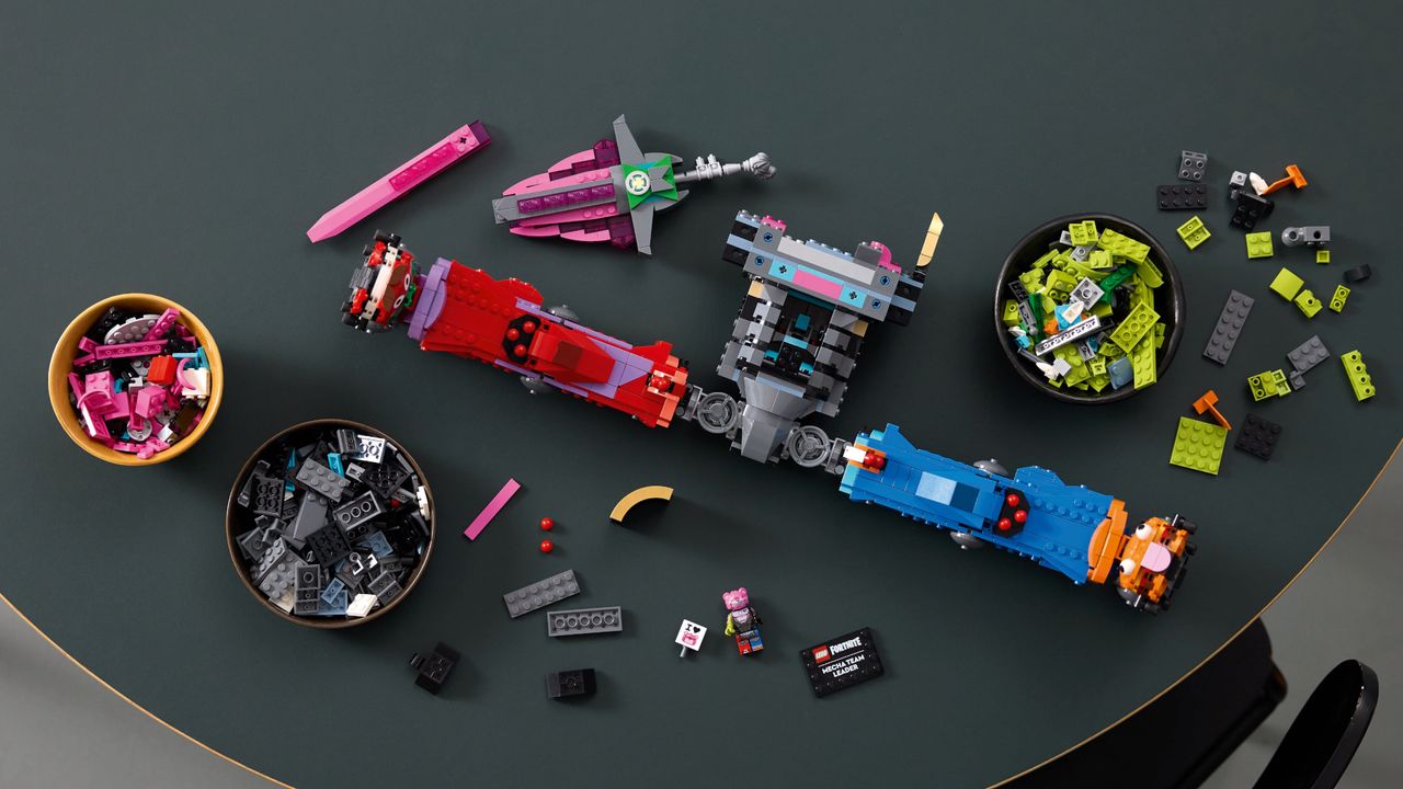 Lego Mecha Team Leader in pieces on a gray table