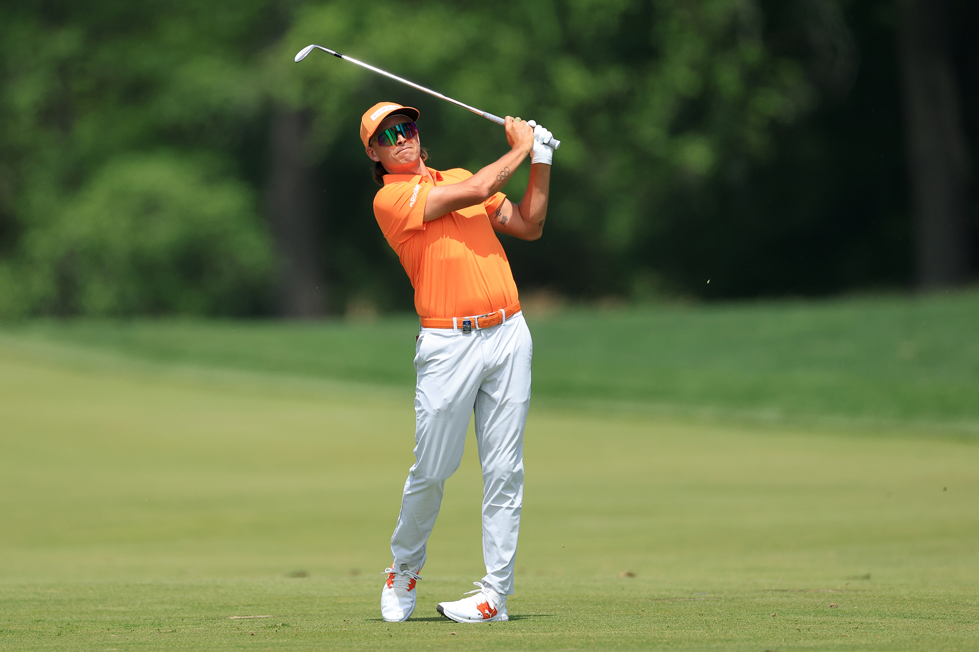 Rickie Fowler in the finish position with an iron