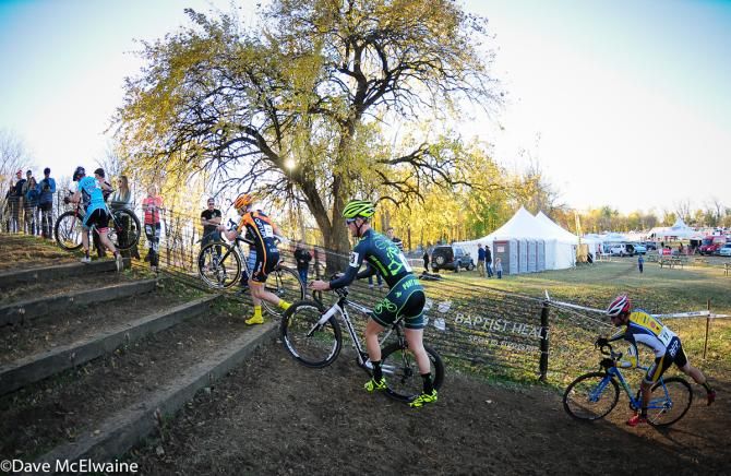 The Elite Men running the first set of stairs on lap one