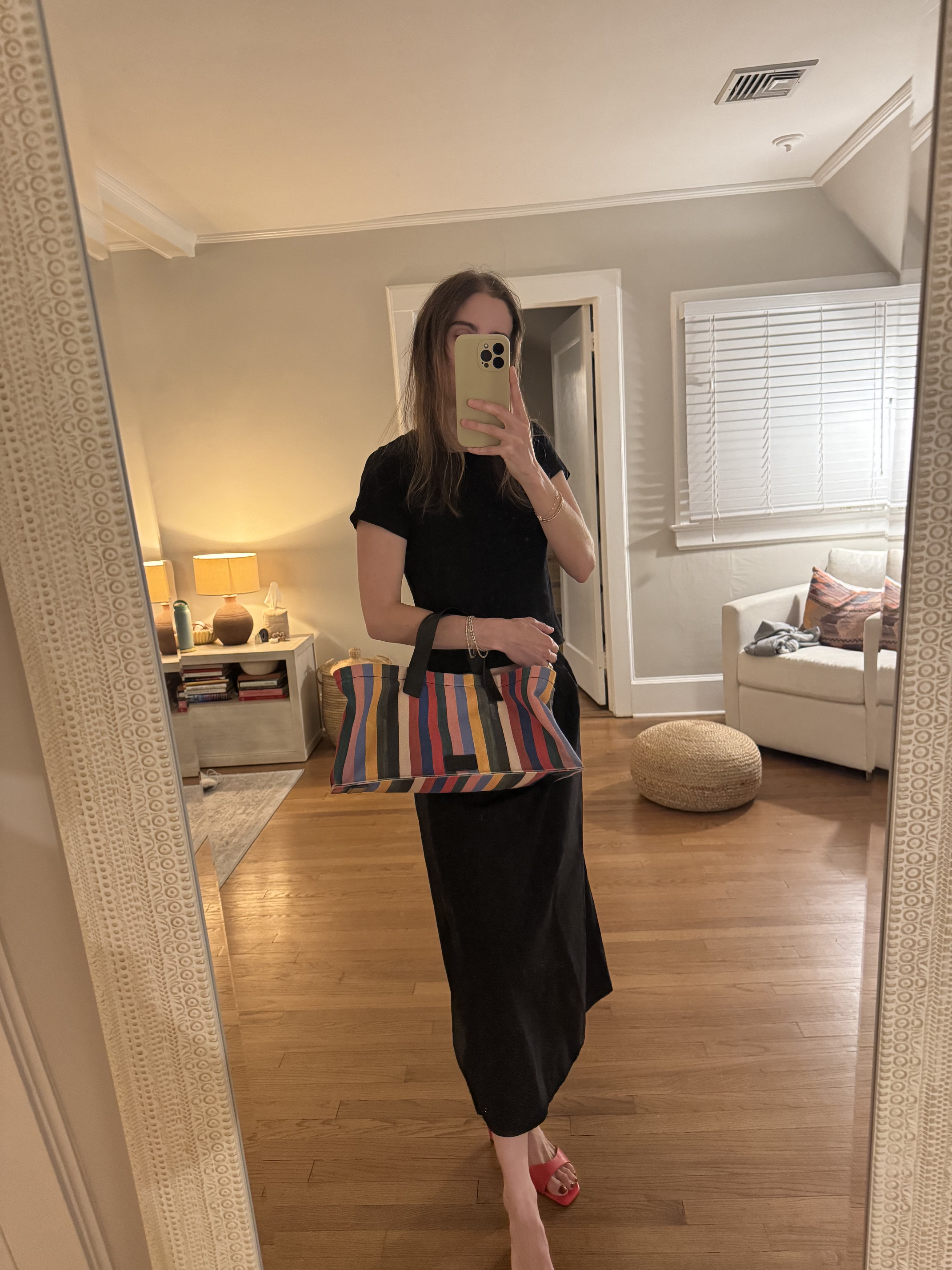 Tessa Faye O'Connell styling a Staud bag