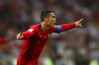 Cristiano Ronaldo celebrates after scoring for Portugal against Spain at the 2018 World Cup.
