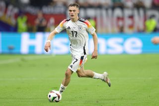 Germany Euro 2024 squad Florian Wirtz of Germany plays the ball during the UEFA EURO 2024 group stage match between Switzerland and Germany at Frankfurt Arena on June 23, 2024 in Frankfurt am Main, Germany.(Photo by Jürgen Fromme - firo sportphoto/Getty Images)