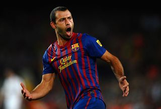 Javier Mascherano celebrates a goal for Barcelona.