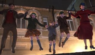 Mary Poppins Returns Mary, Jack, and the kids leap into the air