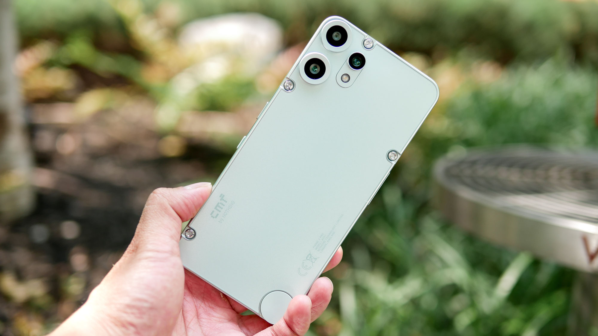 CMF Phone 2 Pro held in the hand showing off its design.