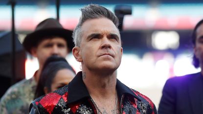 Robbie Williams is seen during the AFL Grand Final Entertainment Media Opportunity at the Melbourne Cricket Ground on September 22, 2022 in Melbourne, Australia. 