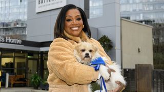 For the Love of Dogs – Alison Hammond in a beige coat holding rescue dog Pip outside Battersea Dogs and Cats Home