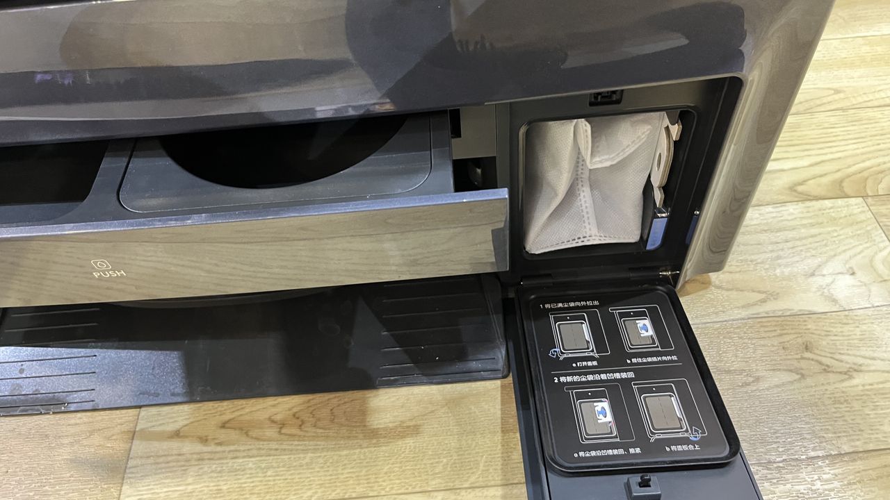 Dust bag and detergent on the eureka robot mop at CES 2024