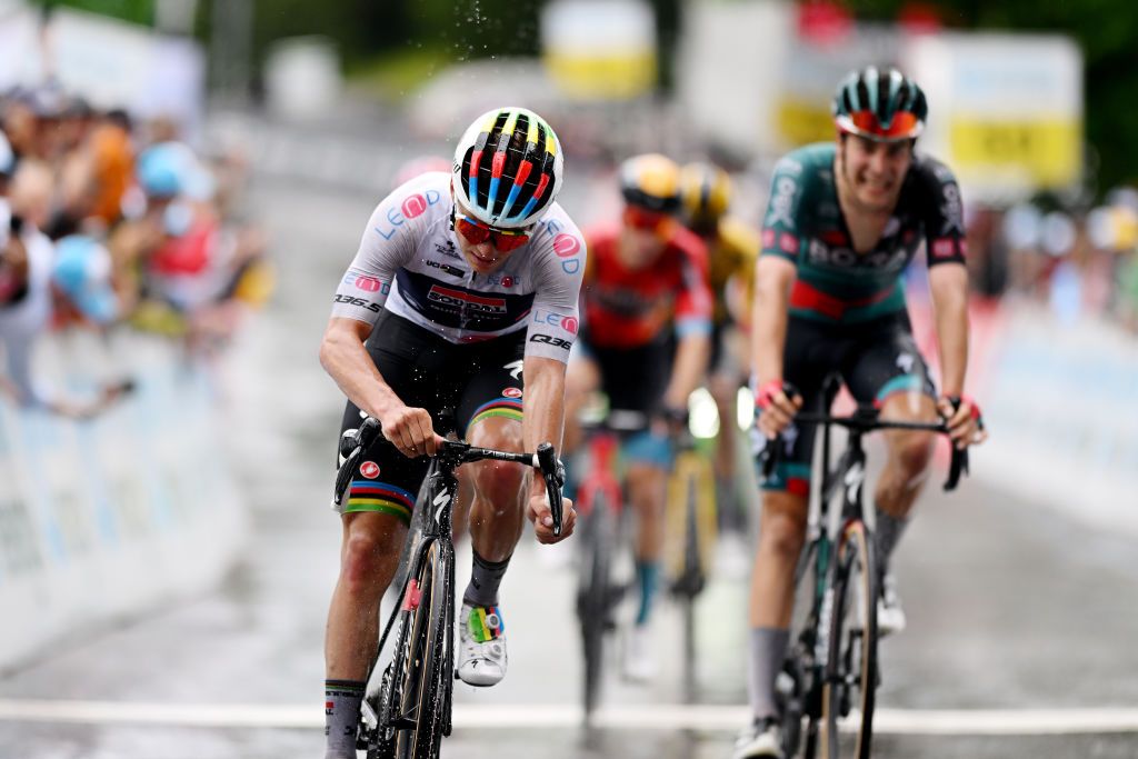 VILLARSSUROLLON SWITZERLAND JUNE 13 Remco Evenepoel of Belgium and Team Soudal QuickStep White best young jersey crosses the finish line during the 86th Tour de Suisse 2023 Stage 3 a 1438km stage from Tafers to VillarssurOllon 1256m UCIWT on June 13 2023 in VillarssurOllon Switzerland Photo by Dario BelingheriGetty Images