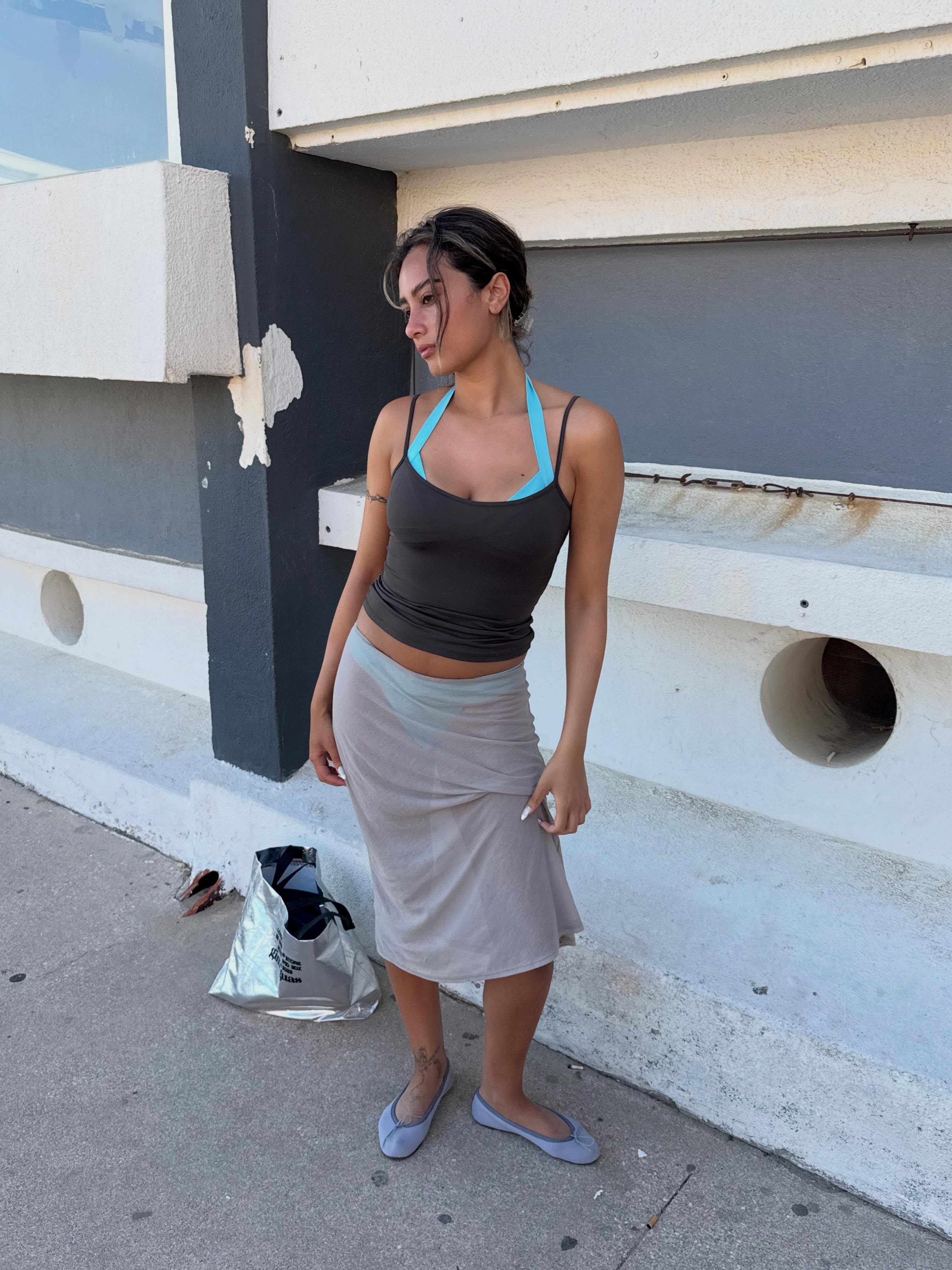 An image of a woman wearing summer ballet flats outfit idea 2026