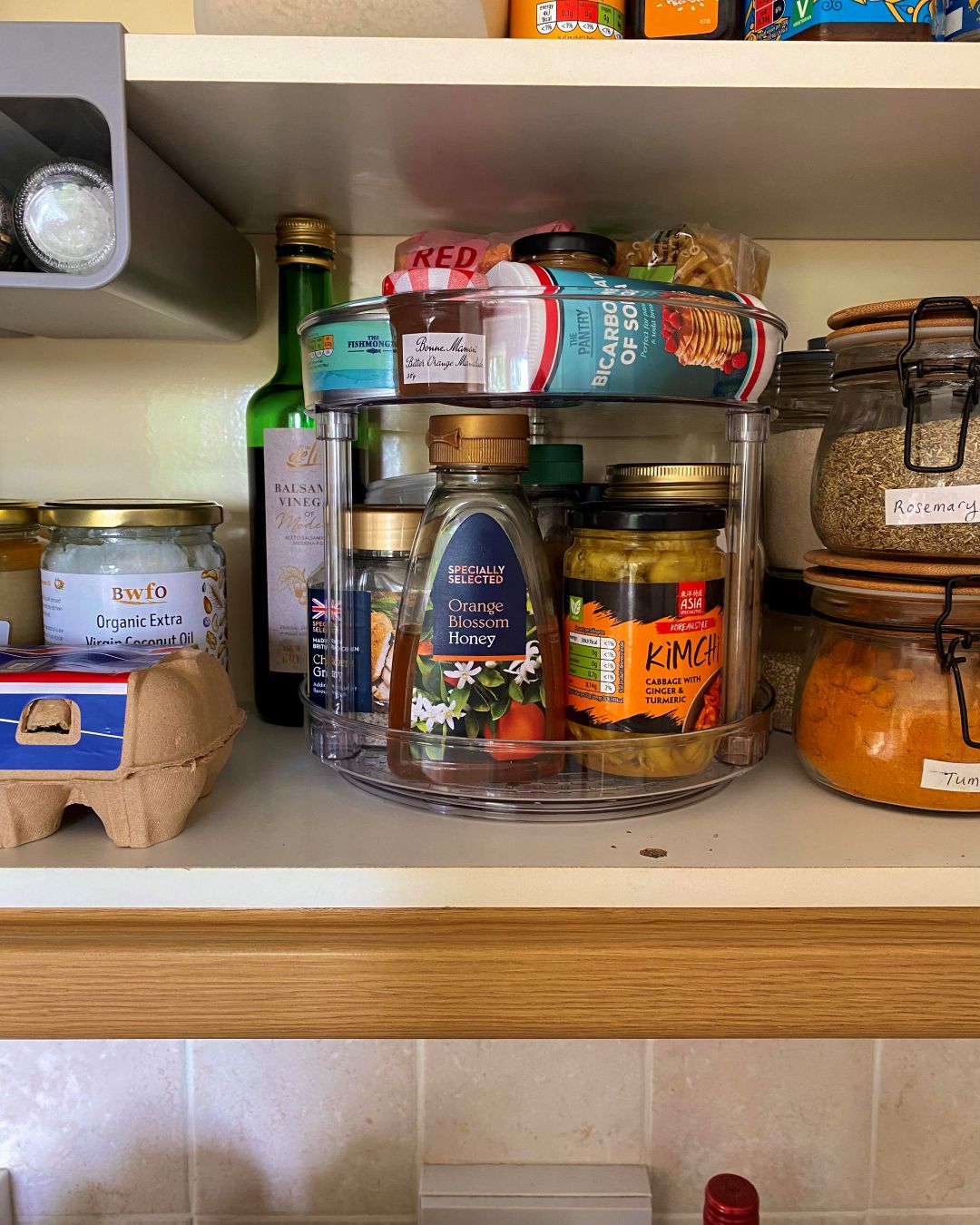 pantry organisation using two-tier turntable organiser small kitchen storage essential