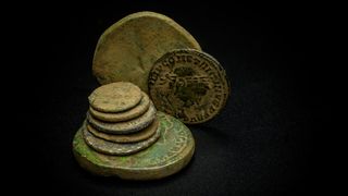 Roman coins uncovered during the archaeology excavation at Blackgrounds, Chipping Warden