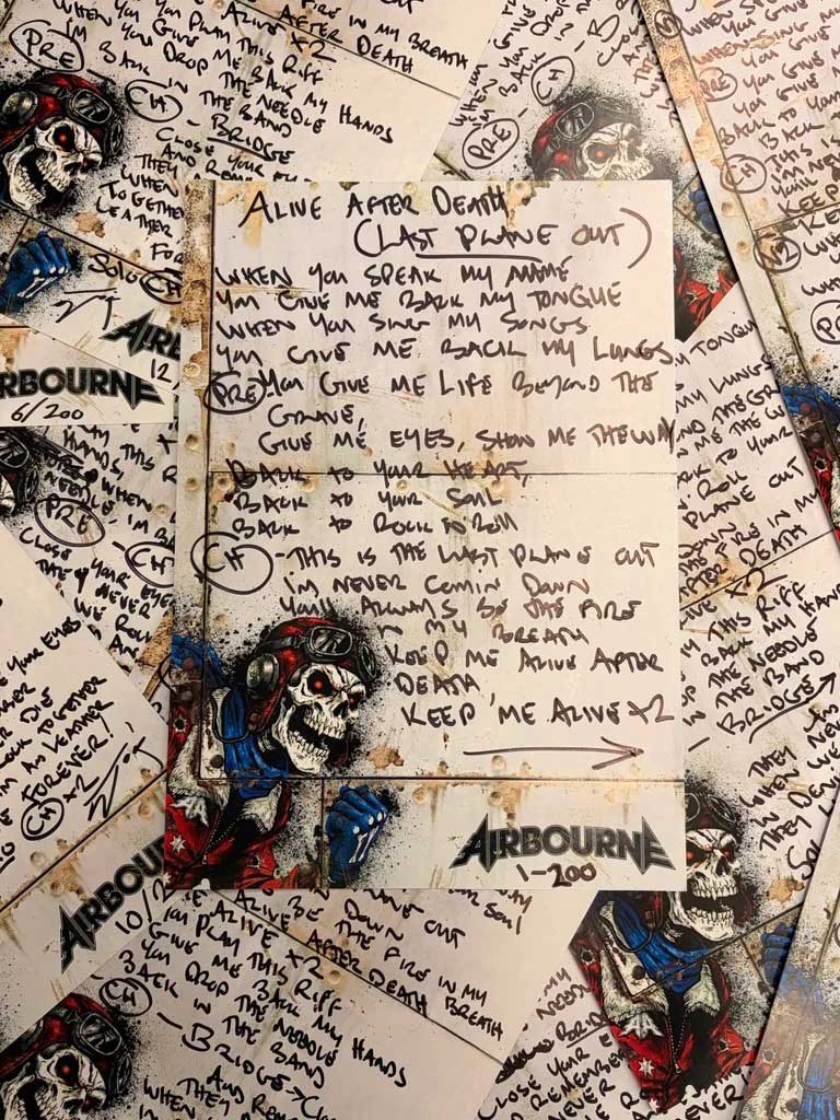 Signed Airbourne lyric card