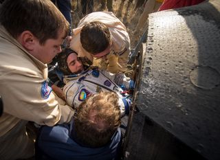 Rescue Crew Helps Chris Cassidy Exit Soyuz Capsule