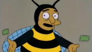 The Bubblebee Man on The Simpsons with his arms out.