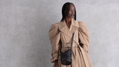 model wearing a trench coat for marie claire shoot