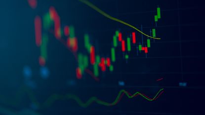 A stock market graph shows stocks going up.