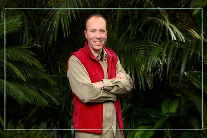 A photo of Matt Hancock in his I'm a Celebrity outfit with a jungle backdrop
