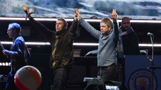 Liam Gallagher and Noel Gallagher perform onstage at the Oasis Live '25 - Toronto concert at Rogers Stadium on August 24, 2025 in Toronto, Ontario, Canada.