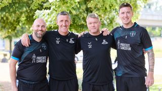 Doncaster Rovers management team, including manager Grant McCann in Prostate United shirts