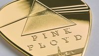 The Royal Mint Pink Floyd gold guitar pick