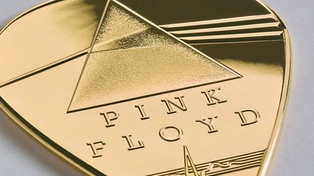 The Royal Mint Pink Floyd gold guitar pick