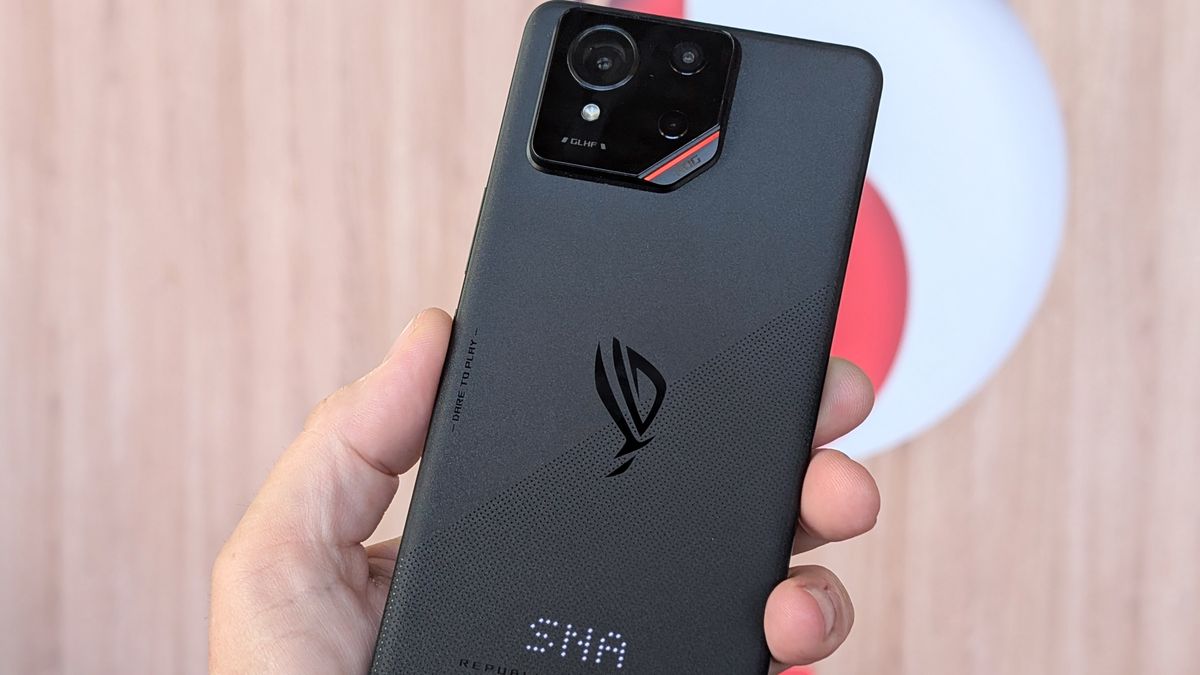 Asus ROG Phone 9 front and back and sides view with Snapdragon logo behind