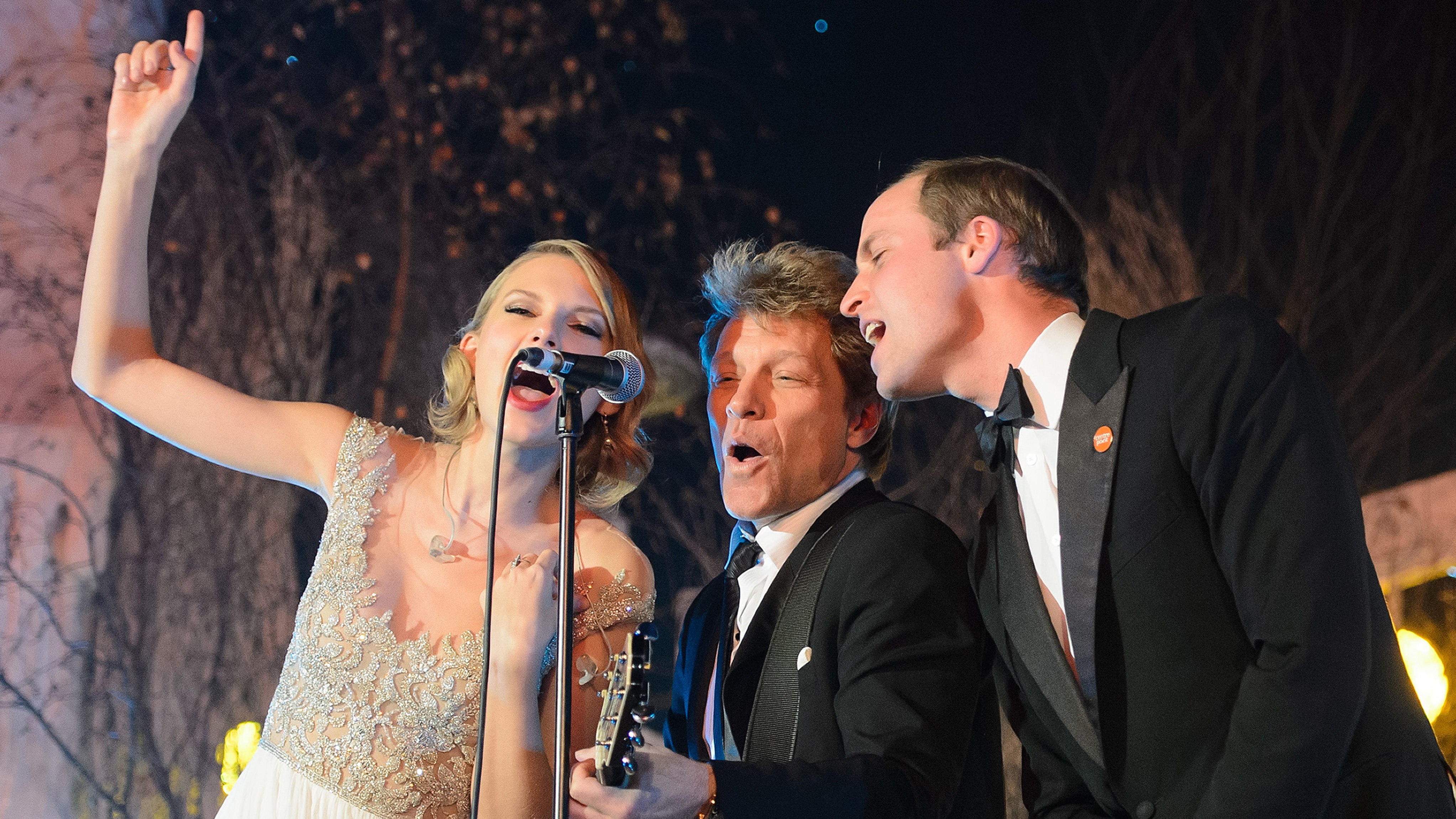 Prince William sings with Taylor Swift and Jon Bon Jovi at the Centrepoint Gala Dinner at Kensington Palace in London, on November 26, 2013