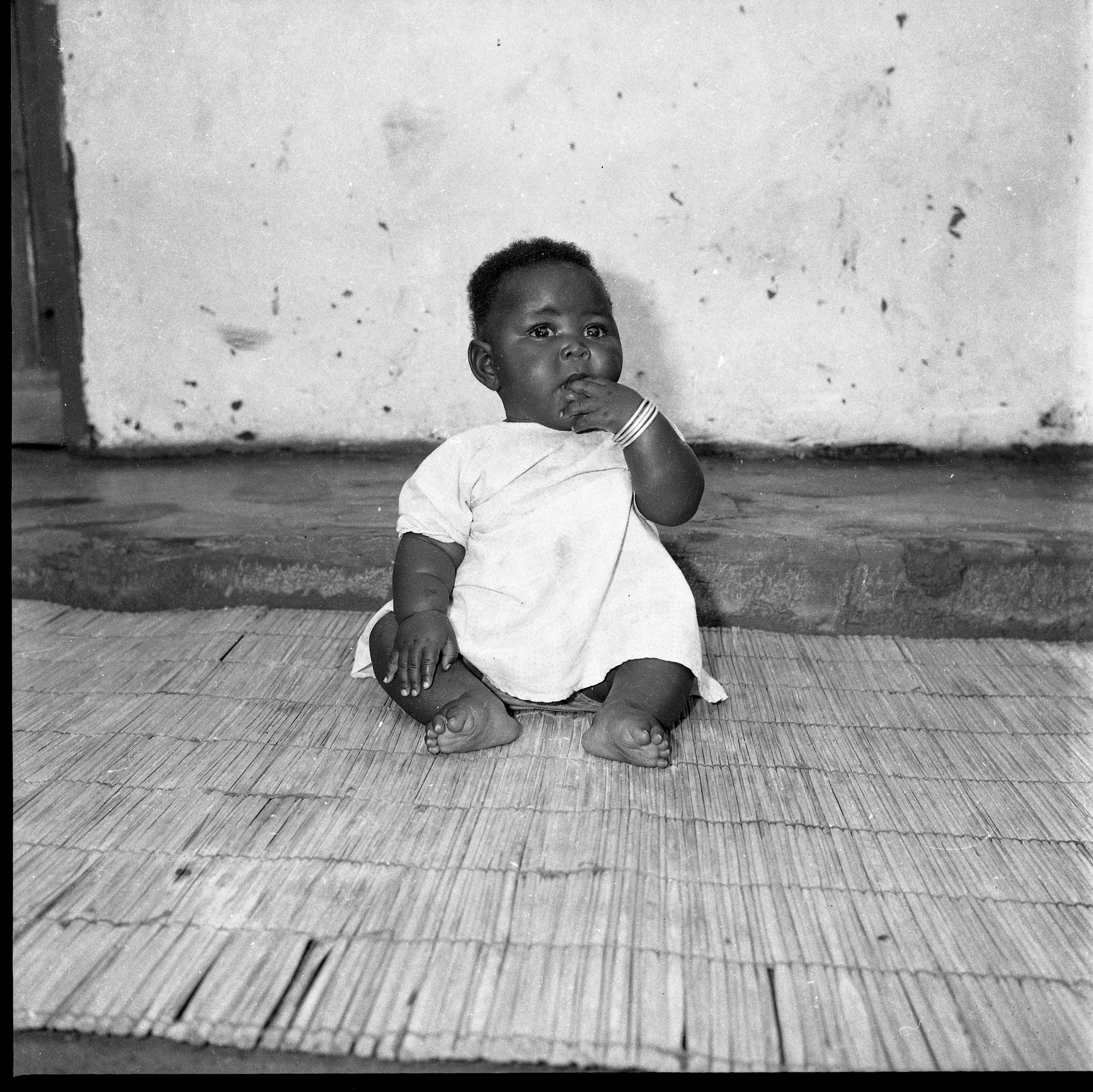black and white images of people posing for camera