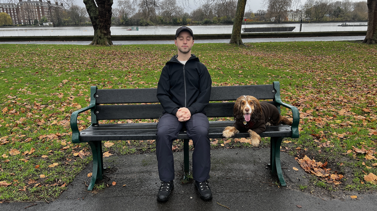 James Frew doing a breathing exercise in a park