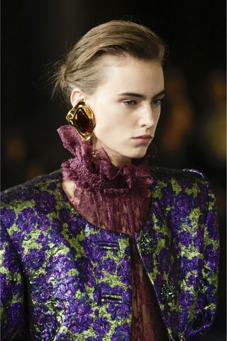 Model at Saint Laurent wearing power hair, a key Spring/Summer 2025 fashion month beauty look