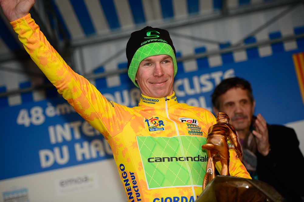 Tom-Jelte Slagter in yellow on the stage 1 podium at Haut Var