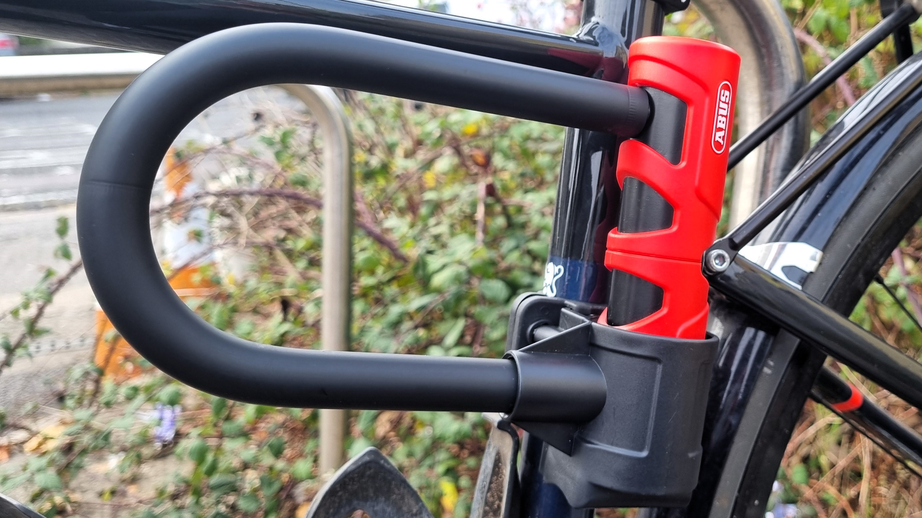 The included bracket means you can carry it on the bike, and store it there when you get home, to avoid leaving it at home. 