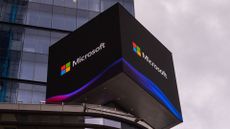 Logo of Microsoft, developer of the Microsoft Entra ID platform, pictured on a billboard in Times Square, New York City.