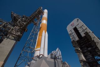 In preparation for launch, the Mobile Service Tower or MST is rolled to its park position at Space Launch Complex-37. ULA's Delta IV rocket is launching the Air Force's ninth Wideband Global SATCOM (WGS-9) satellite.