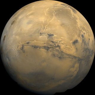 Mars' gigantic Valles Marineris canyon system is seen in this mosaic of images taken by NASA's Viking 1 orbiter.