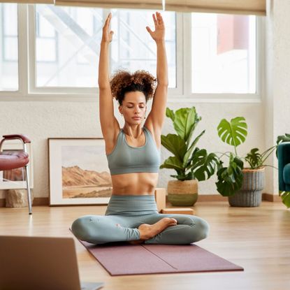 A woman trying a stretching workout