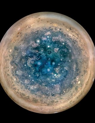 The south pole of Jupiter is seen from an altitude of 32,000 miles (52,000 kilometers) in this enhanced color mosaic of images from NASA's JunoCam. Cyclones up to 600 miles wide (1,000 km) are visible.