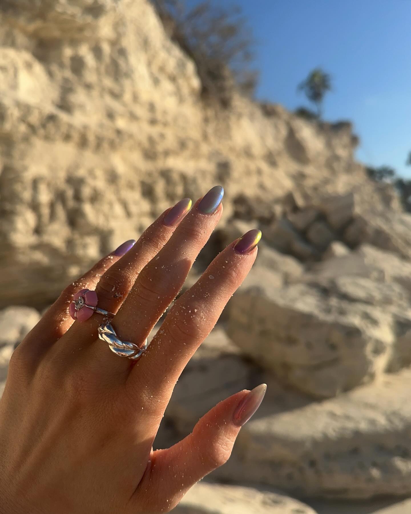 An image of Kylie Jenner's seaglass-inspired nails.