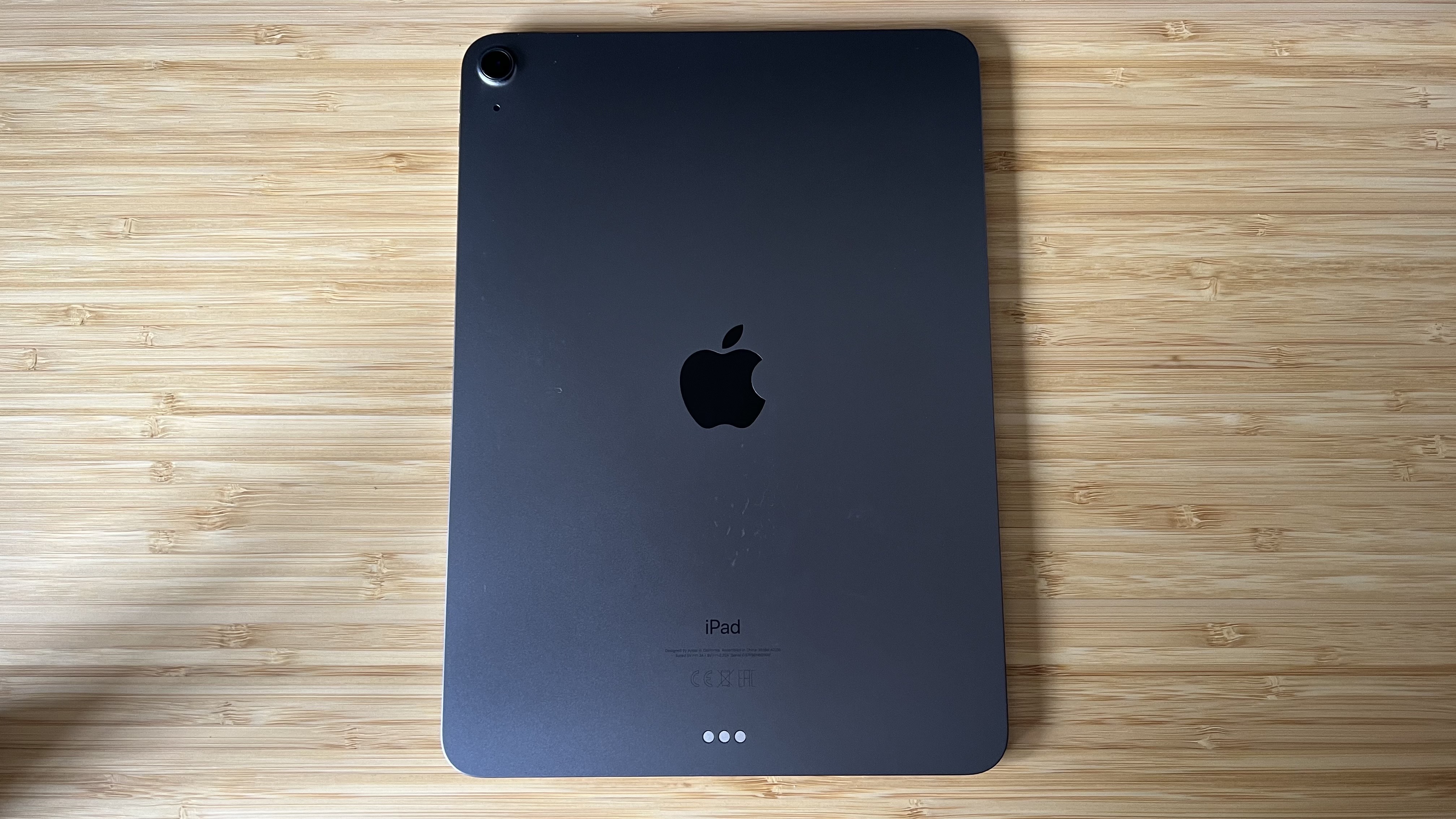 back panel of ipad air on a wooden table