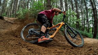 Canyon Spectral:ONfly being ridden around a berm